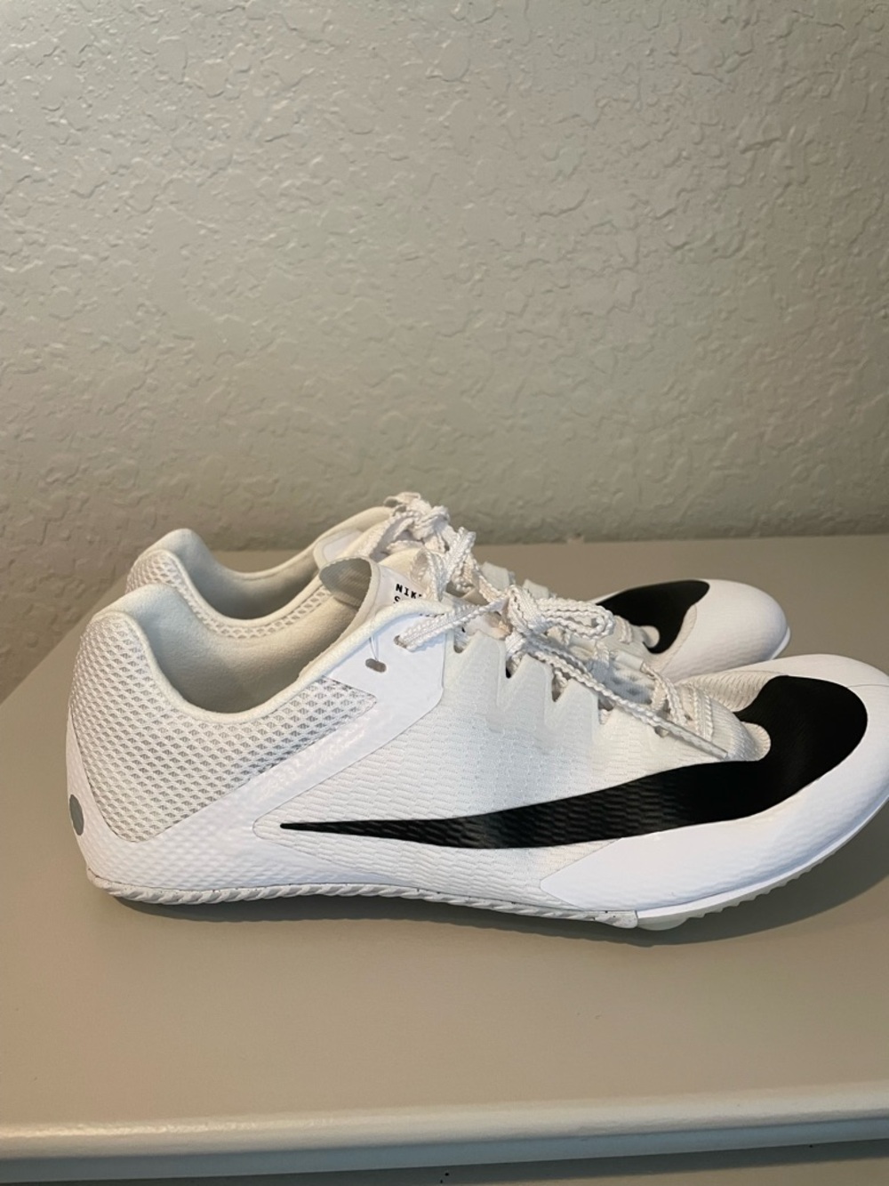 Nike Men's White Athletic Track Spikes with Black Swoosh